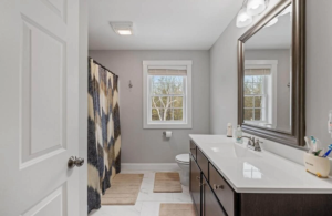 A beautiful bathroom remodeling in Austin, TX, showcasing neutral tones and modern fixtures, offering a calm and refreshing space.