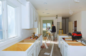 Top home remodeling contractors in Austin delivering full kitchen overhauls—balancing layout, lighting, and cabinetry for a seamless transformation.