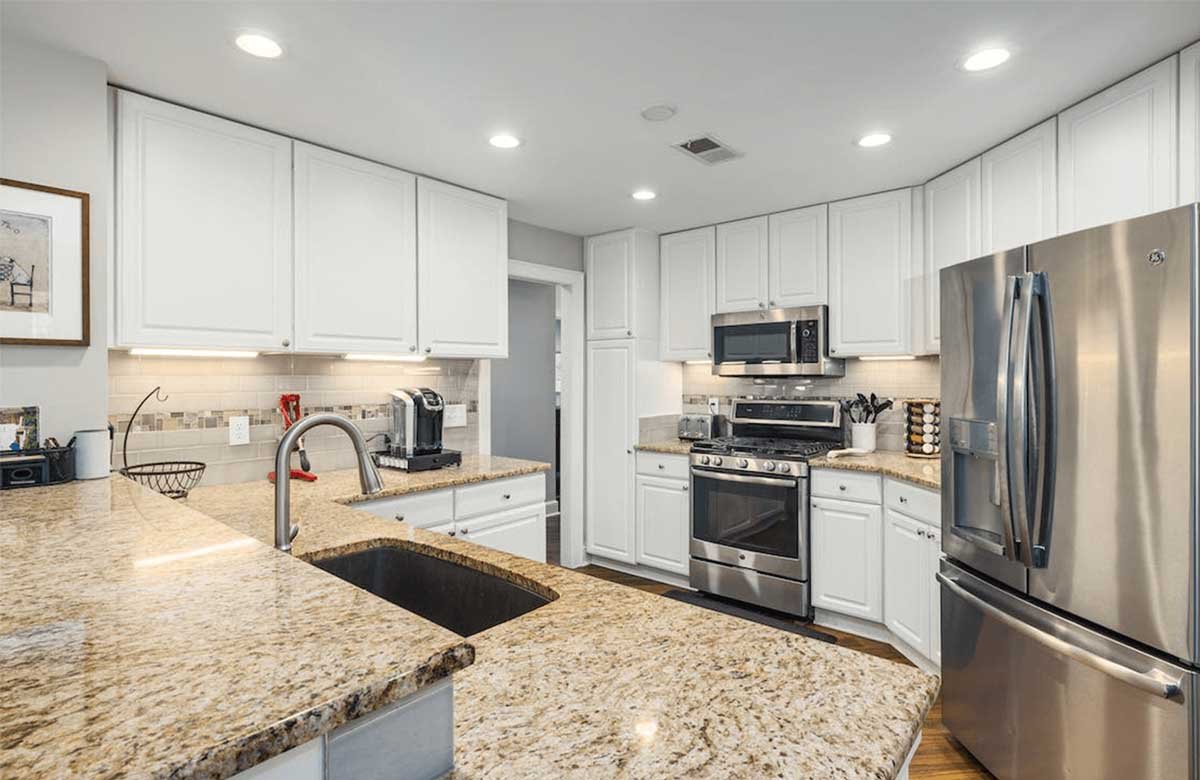 custom kitchen renovation company | Expert split level kitchen remodel design in Austin with modern solutions.